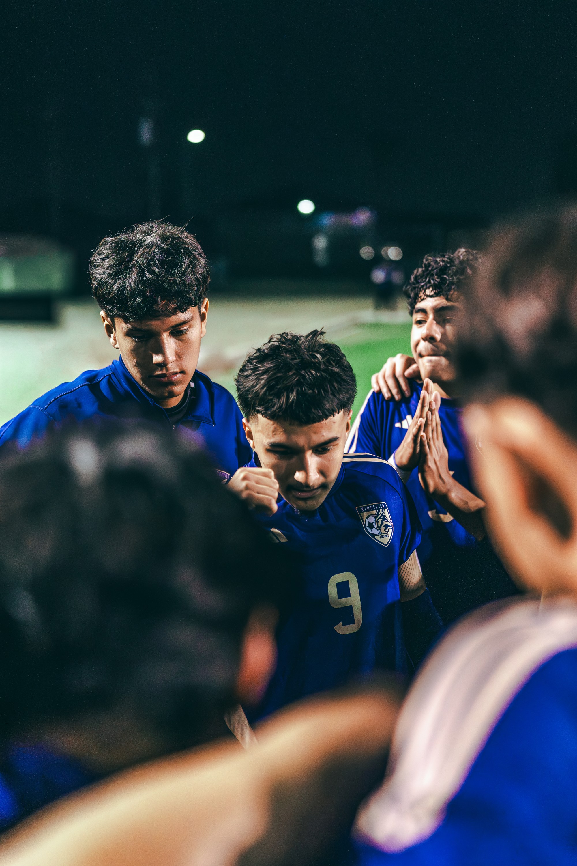 Ridgeview teammates gathered closely in a pregame huddle